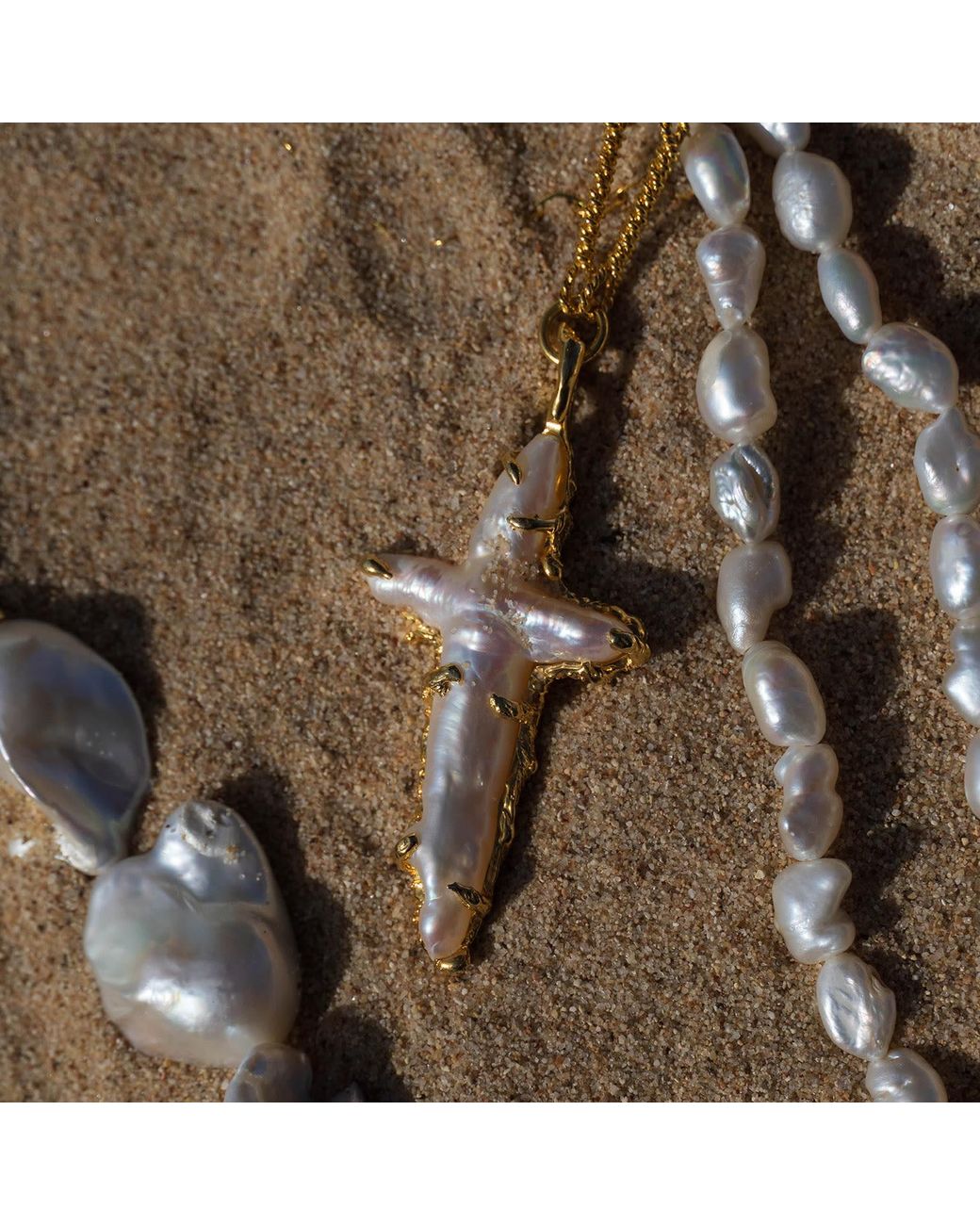 Ece London Metallic The Tethys Baroque Pearl Cross With The Roman Chain