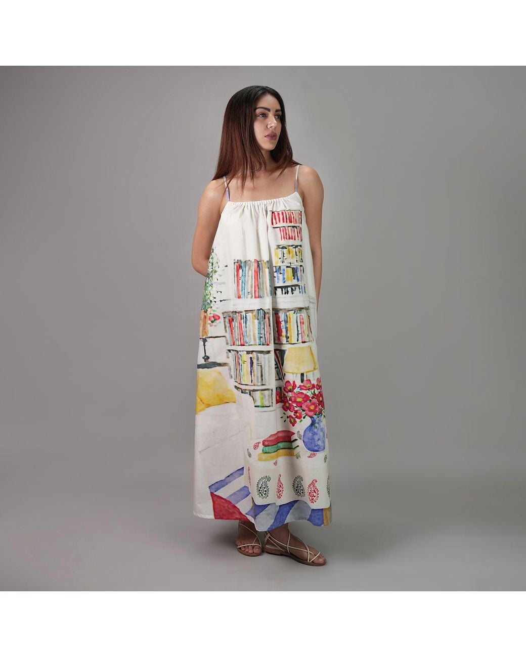 DHARA SHETH DUBAI White Abode Artistic Bookshelf Printed Spaghetti Strap Maxi Dress