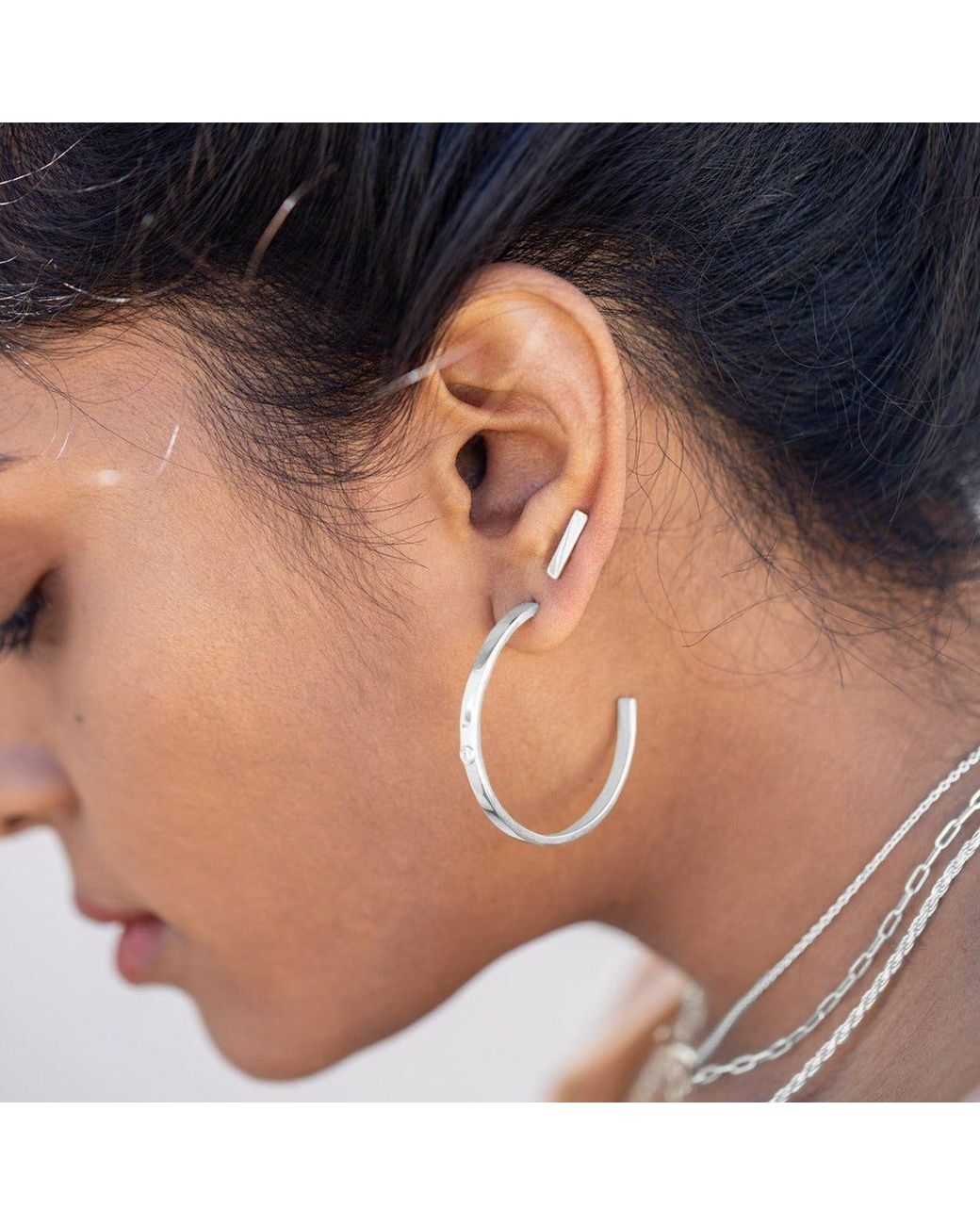 Cier White Flex Stud Earrings