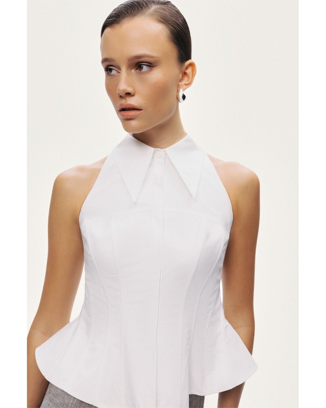Nocturne White Structured Halter Peplum Top