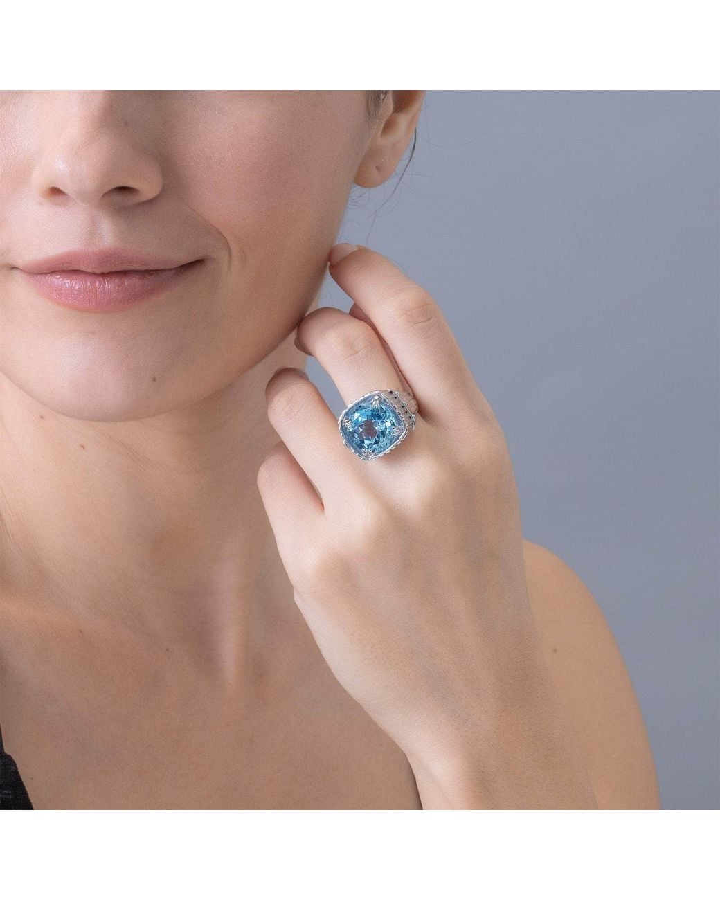 German Kabirski Blue Lyric Textured Ring With Natural Round Cut Topaz