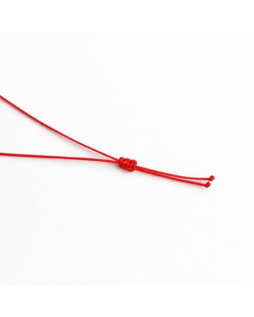 The Pheia Metallic String Fish Necklace