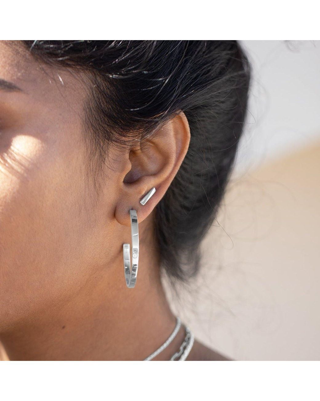 Cier White Flex Stud Earrings