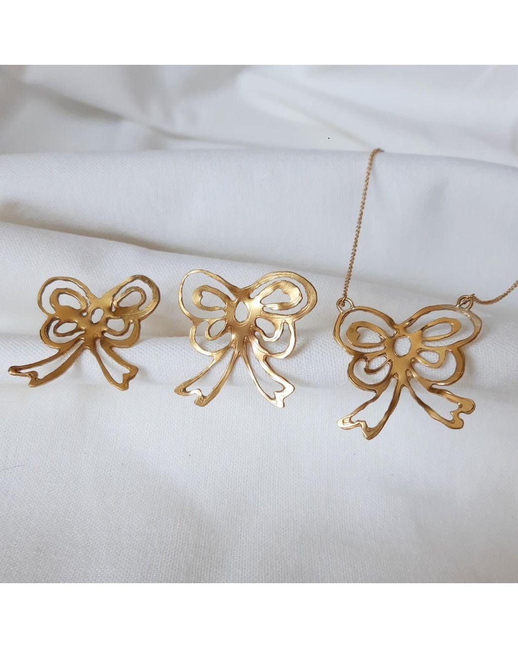 Lily Flo Jewellery Metallic Large Bow Earrings