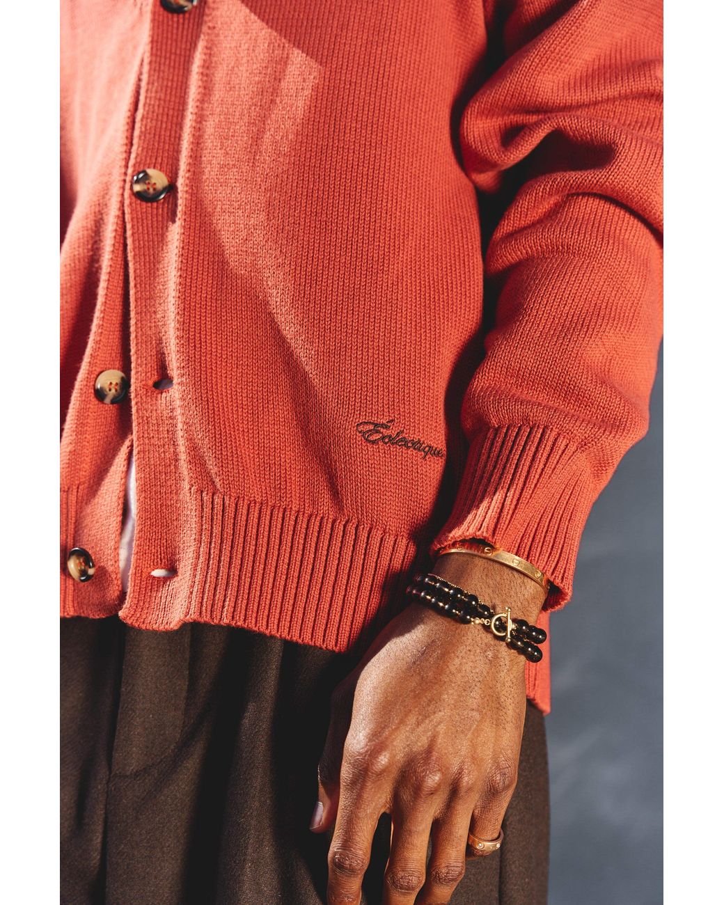 Éclectique Orange V Neck Cardigan for men