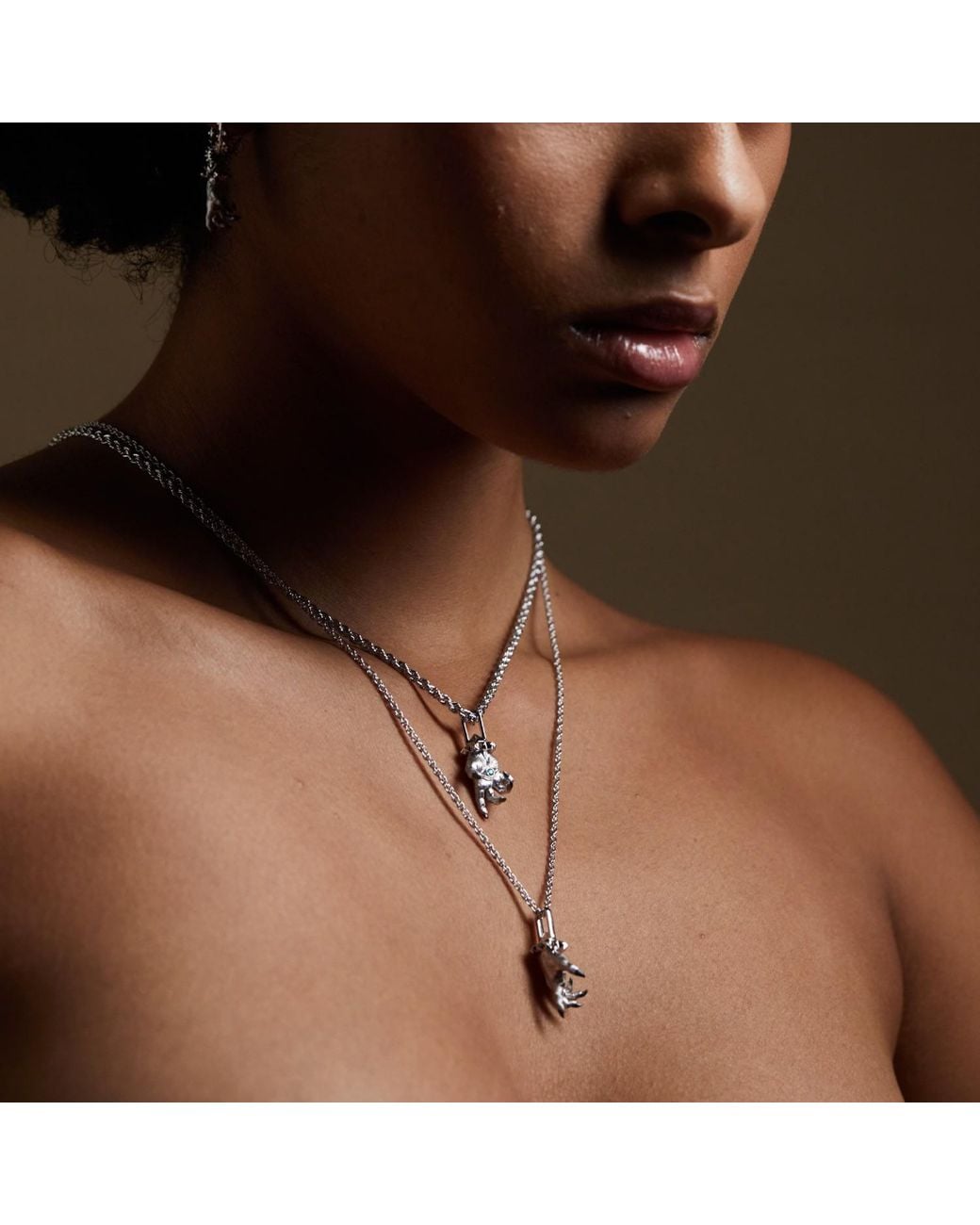 Kasun Metallic Hand Of The Protector Pendant