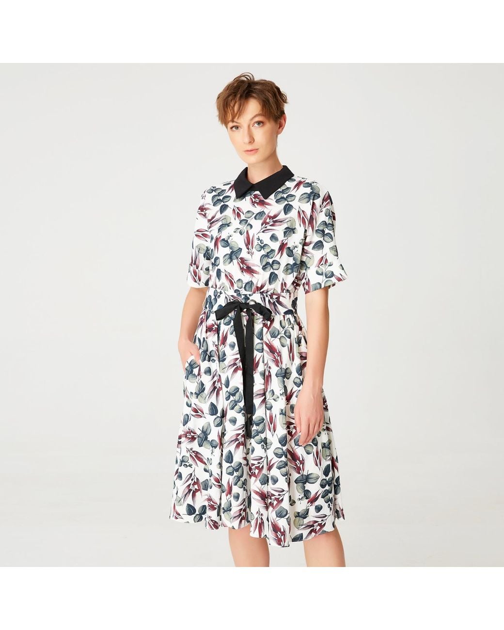 Smart and Joy White Fit-And-Flare Leaves Print Dress With Wide Belt