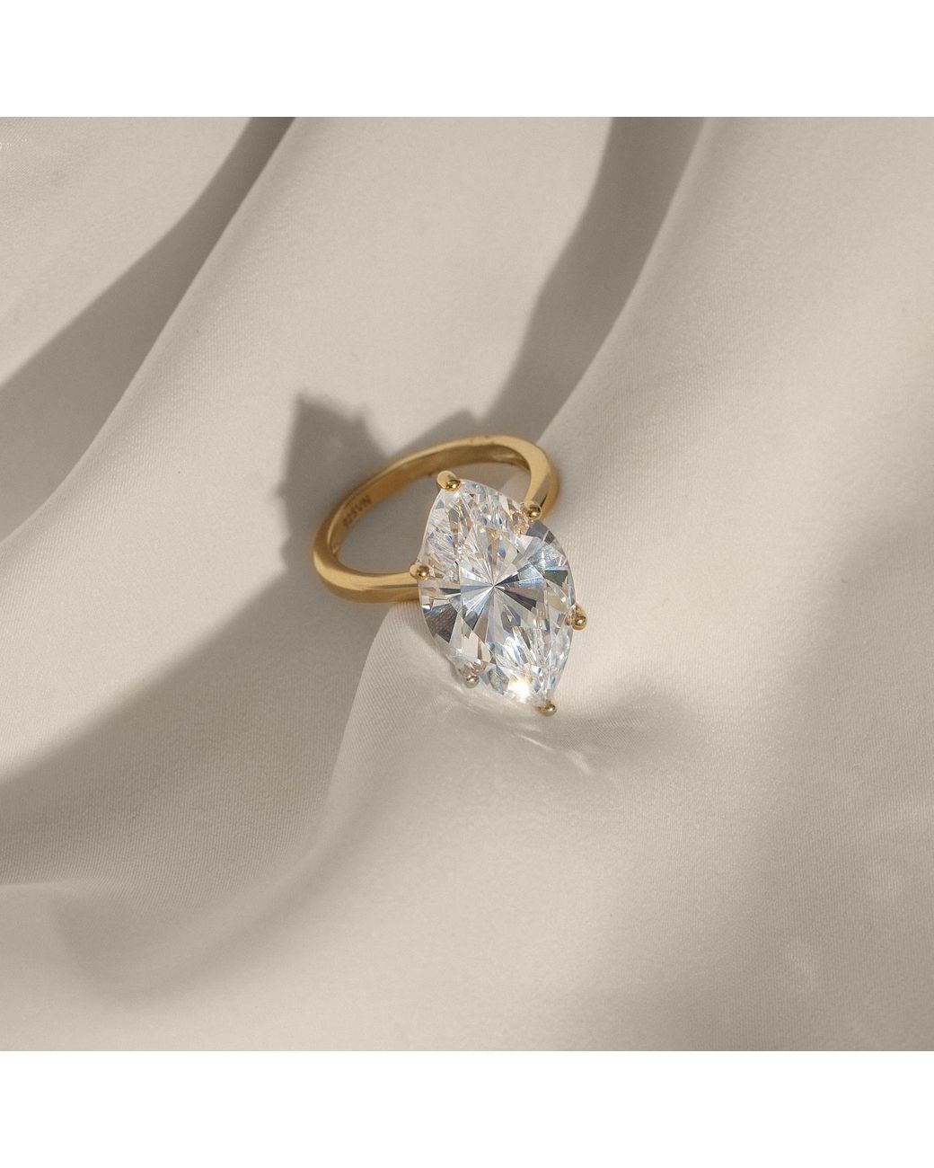 Diamonbliss Metallic Ten Carats Marquise Cut Solitaire Cocktail Ring