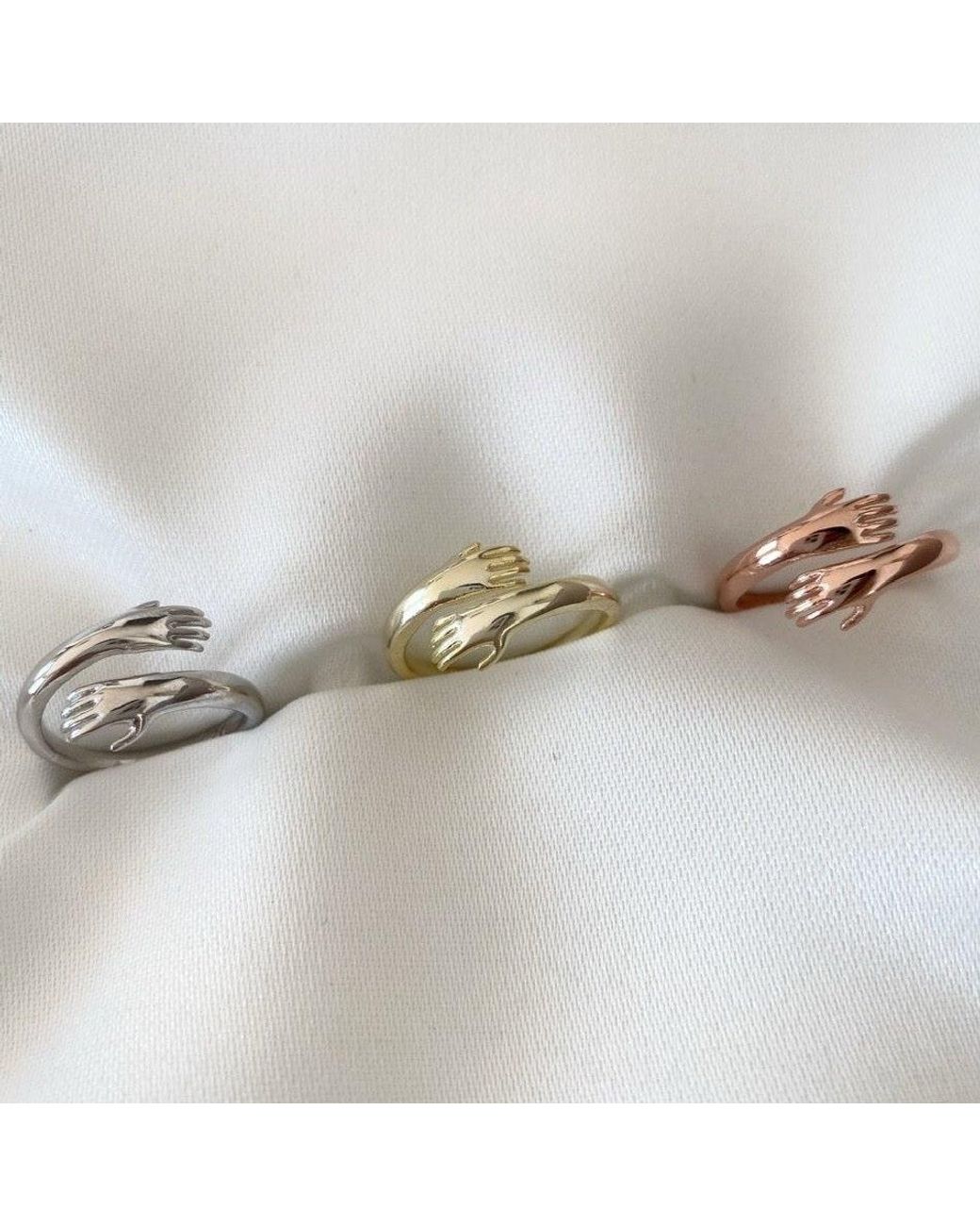 Spero London Metallic Hug Ring With Hands Sterling