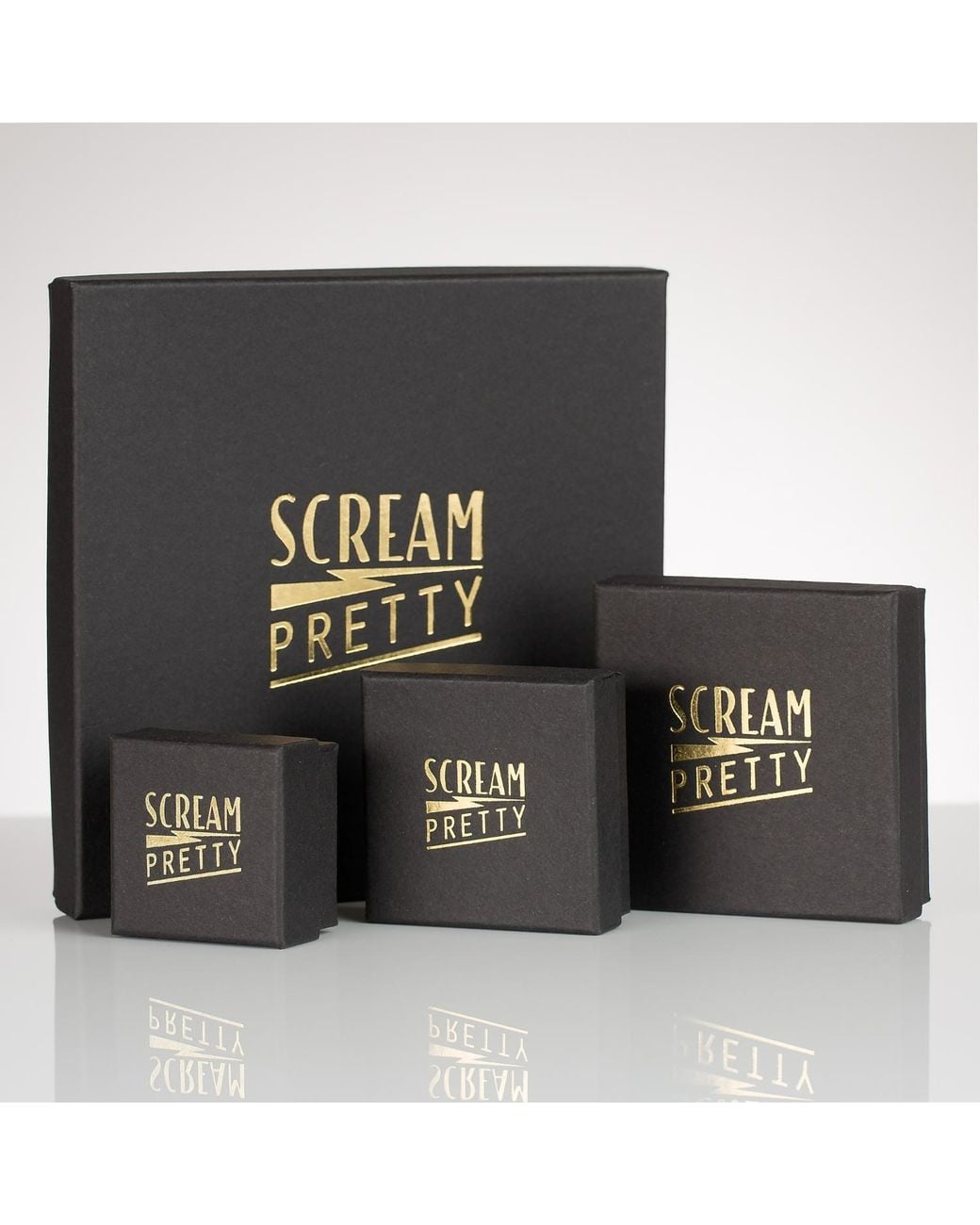 Scream Pretty Metallic Sparkling Single Star Huggie Earrings