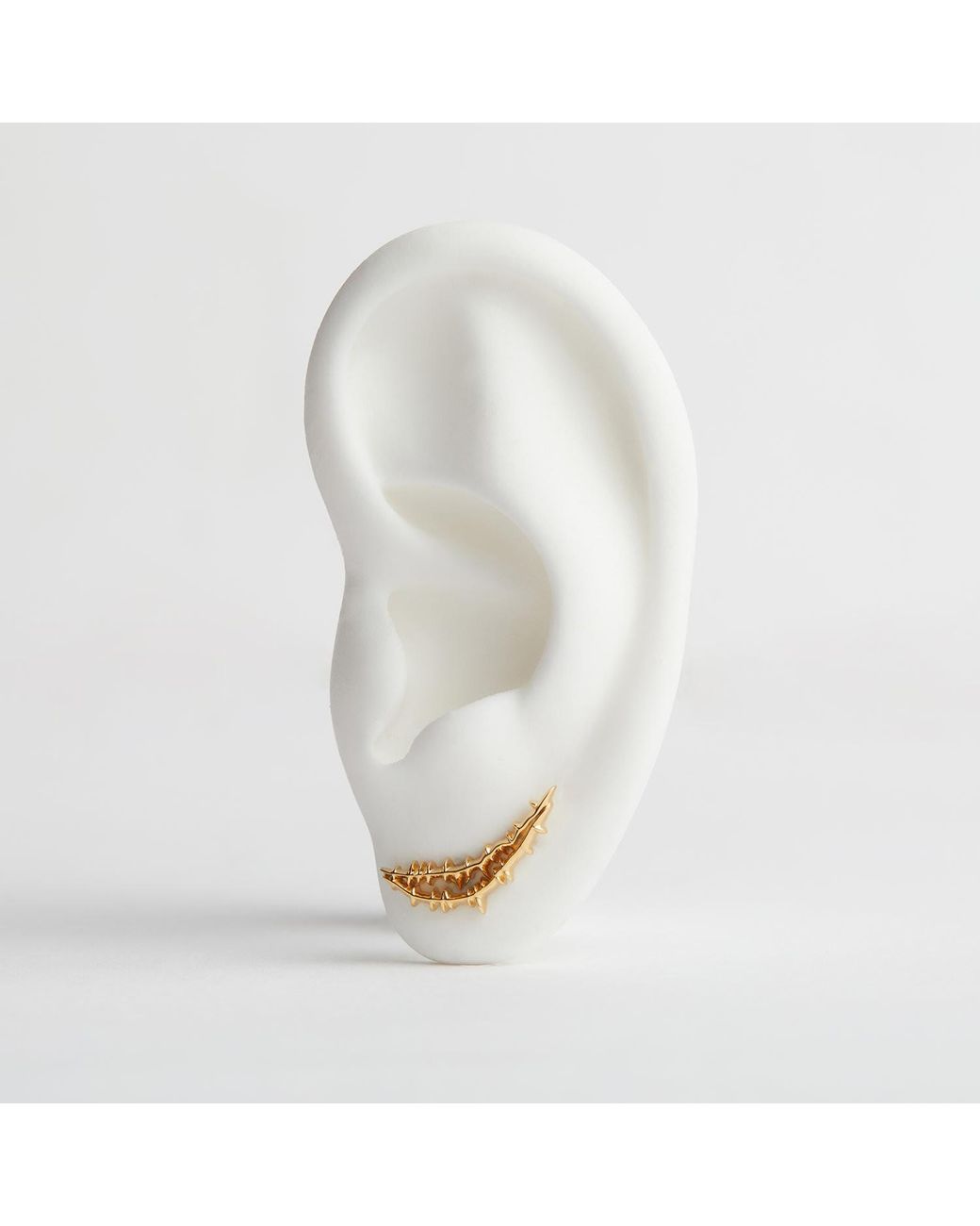 Kasun Metallic Smile Stud Earrings