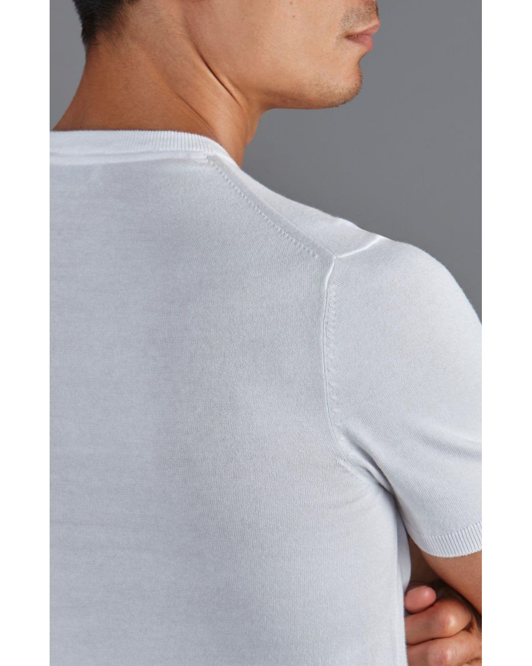 Paul James Knitwear White Ultra Fine Cotton Hudson High V Neck Knitted T-Shirt for men