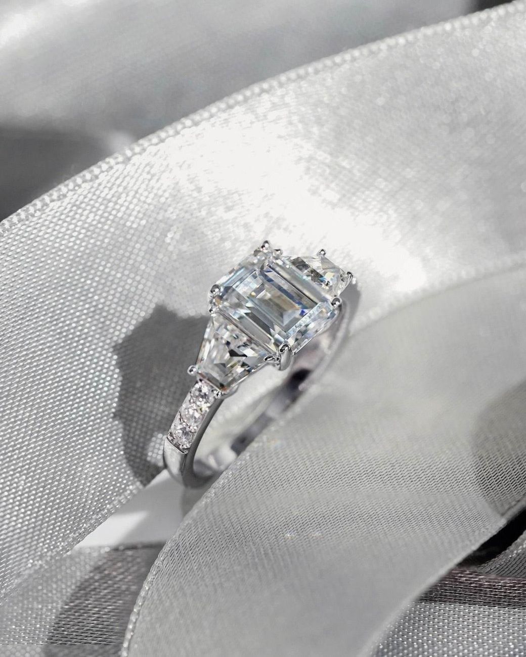 Diamonbliss White Emerald Cut With Trapeze Side Stone Engagement Ring
