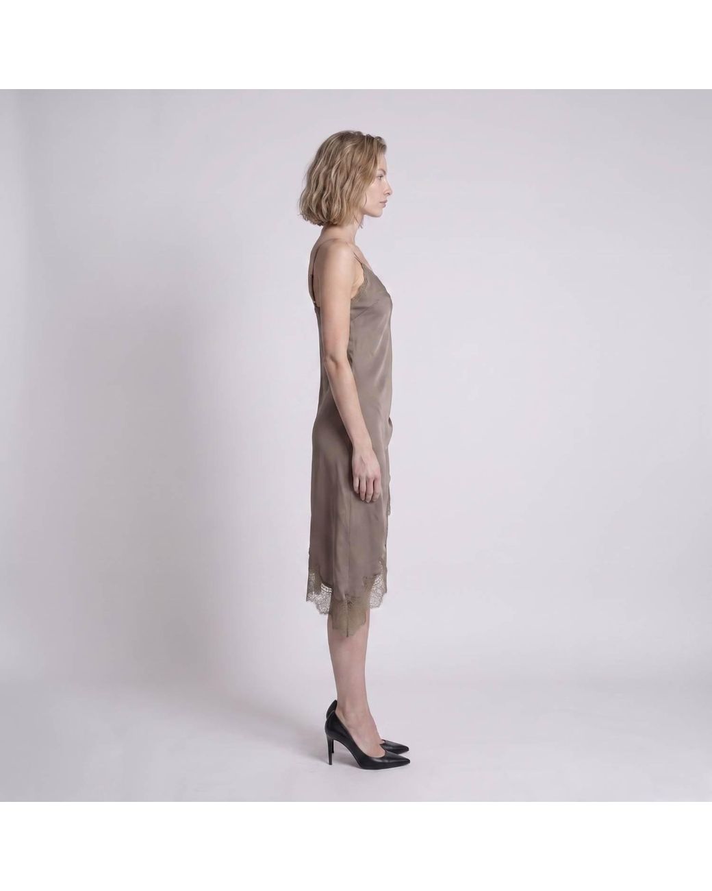 Modenaire Brown Asymmetric Satin Slip Dress With Lace Trim And Fluid Draping