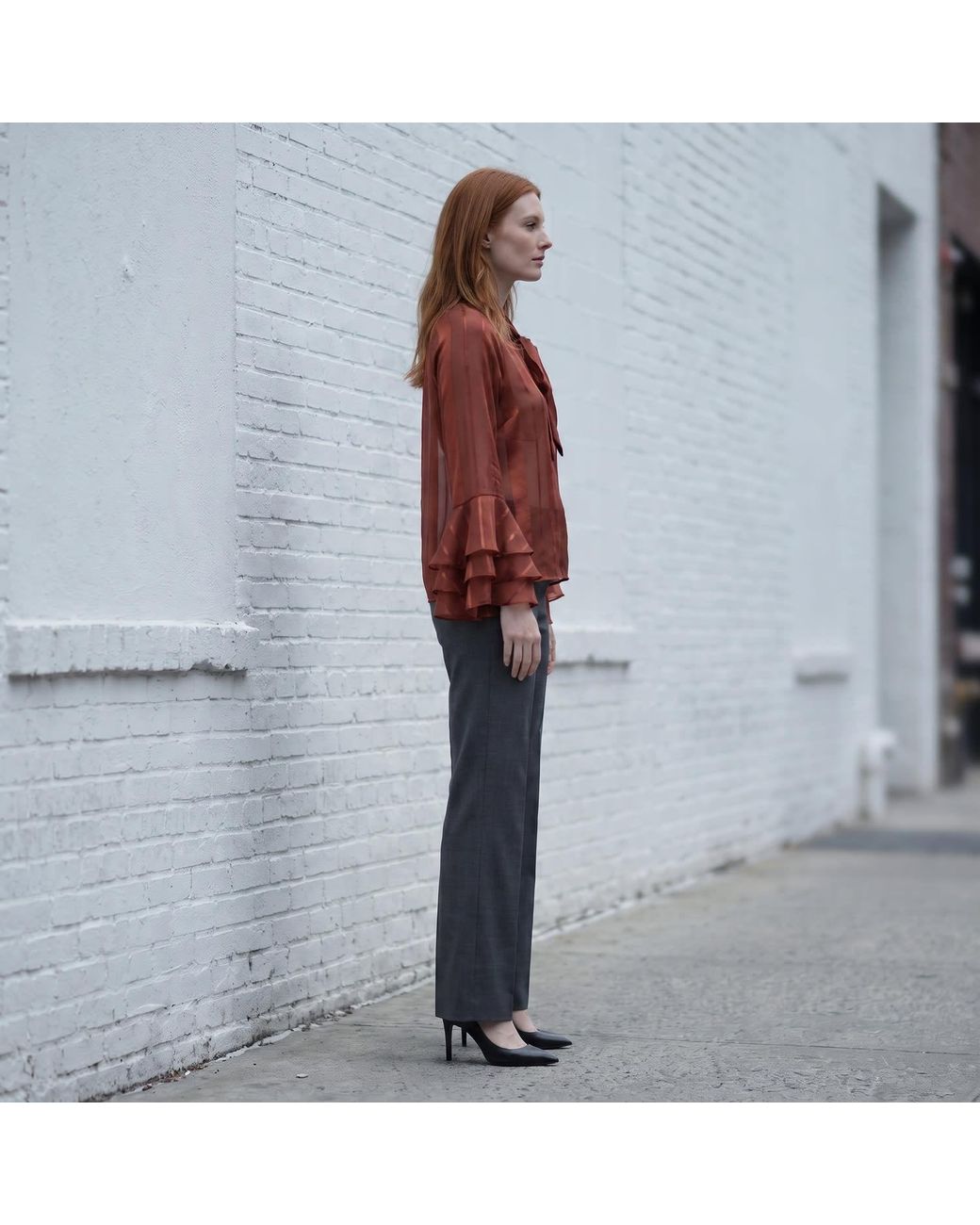 Modenaire Red Sheer Blouse With Tie Neck Detail And Bell Sleeves