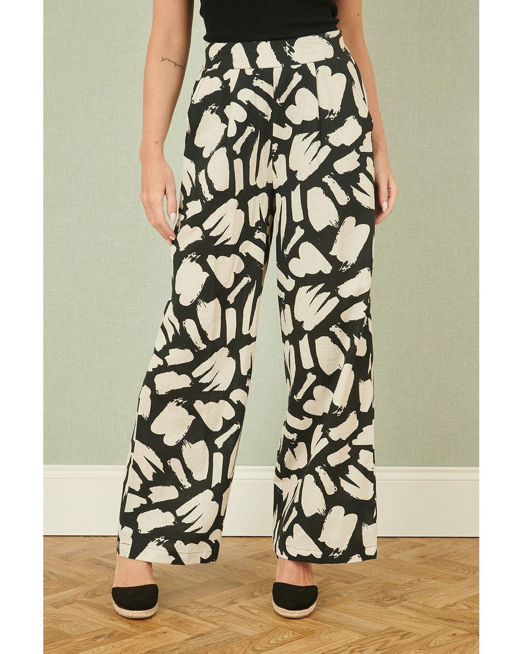Yumi' Black Cotton Splash Print Relaxed Fit Trousers