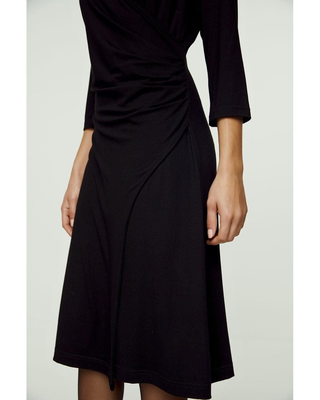 Conquista Black Faux Wrap Dress