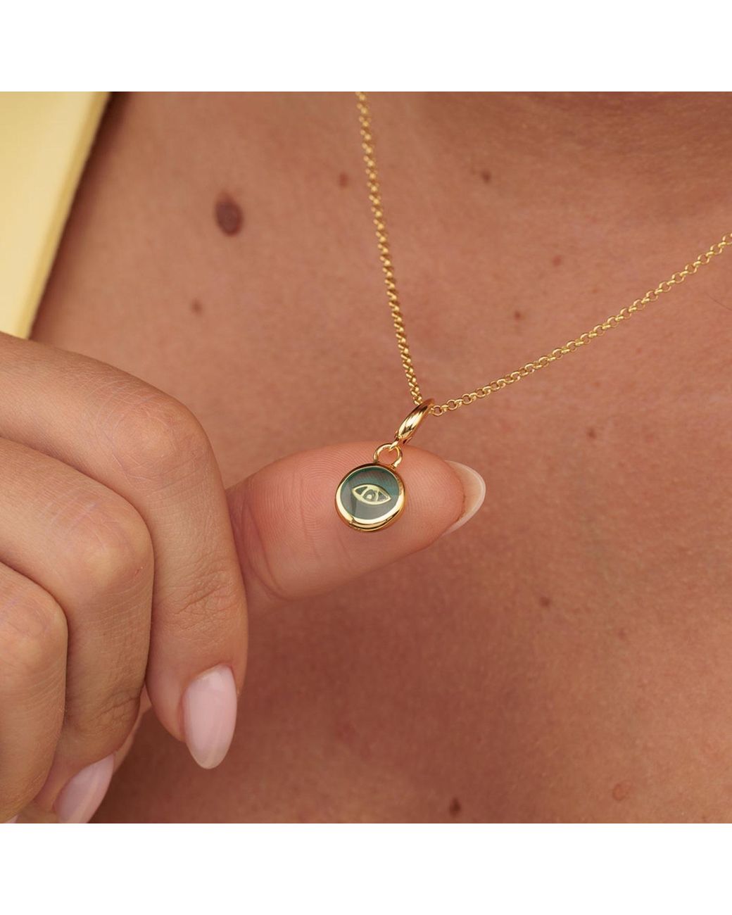 Lily Charmed Metallic Plated Eye Resin Capture Charm Necklace