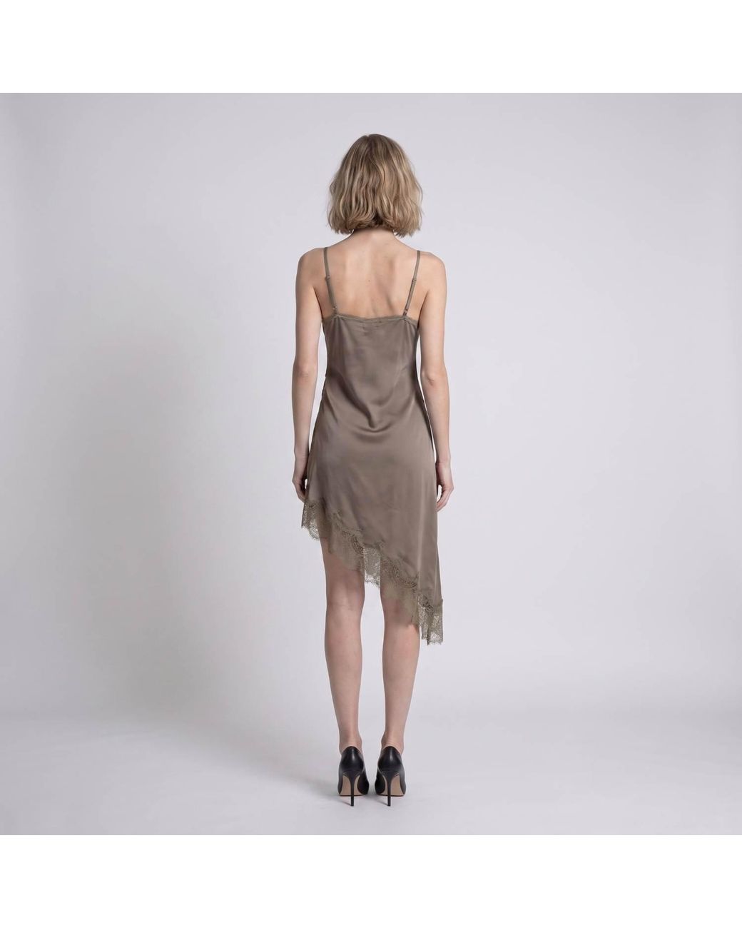 Modenaire Brown Asymmetric Satin Slip Dress With Lace Trim And Fluid Draping