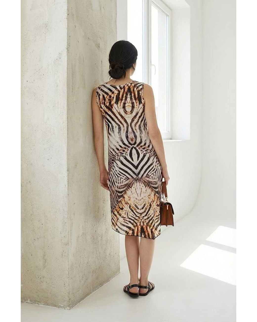 Conquista White Sleeveless Asymmetric Midi Dress With Zebra-Inspired Abstract Print