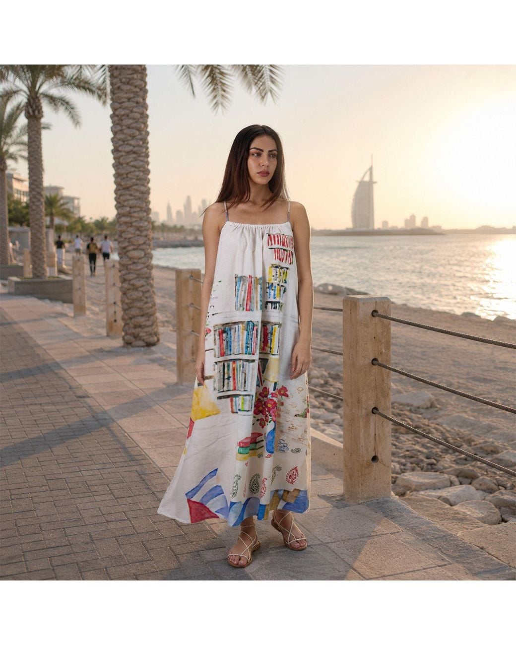 DHARA SHETH DUBAI White Abode Artistic Bookshelf Printed Spaghetti Strap Maxi Dress