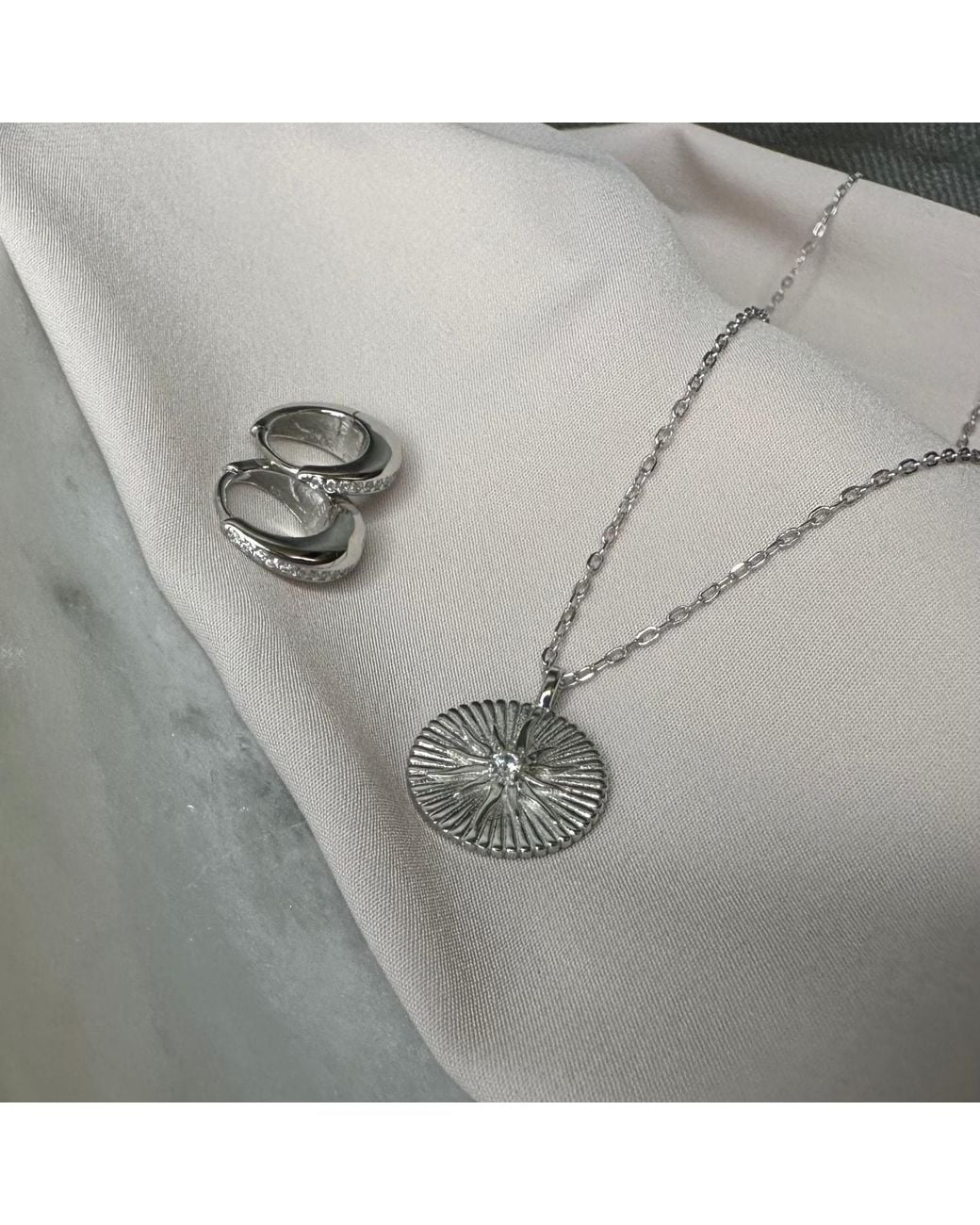 Clemence Wren Metallic Radiant Star Pendant Necklace