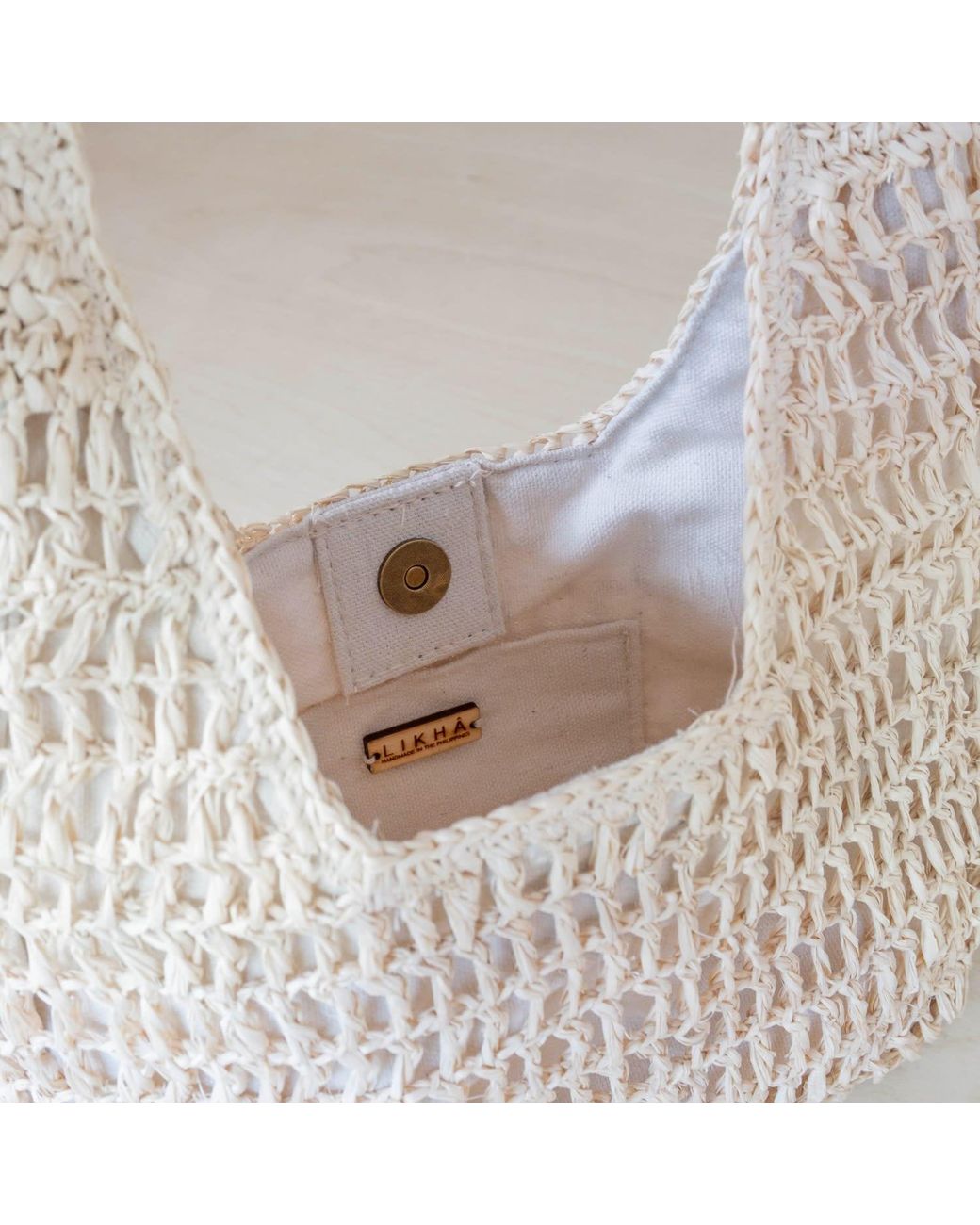LIKHÂ White Neutrals Handwoven Raffia Hobo Bag – Poste Weave