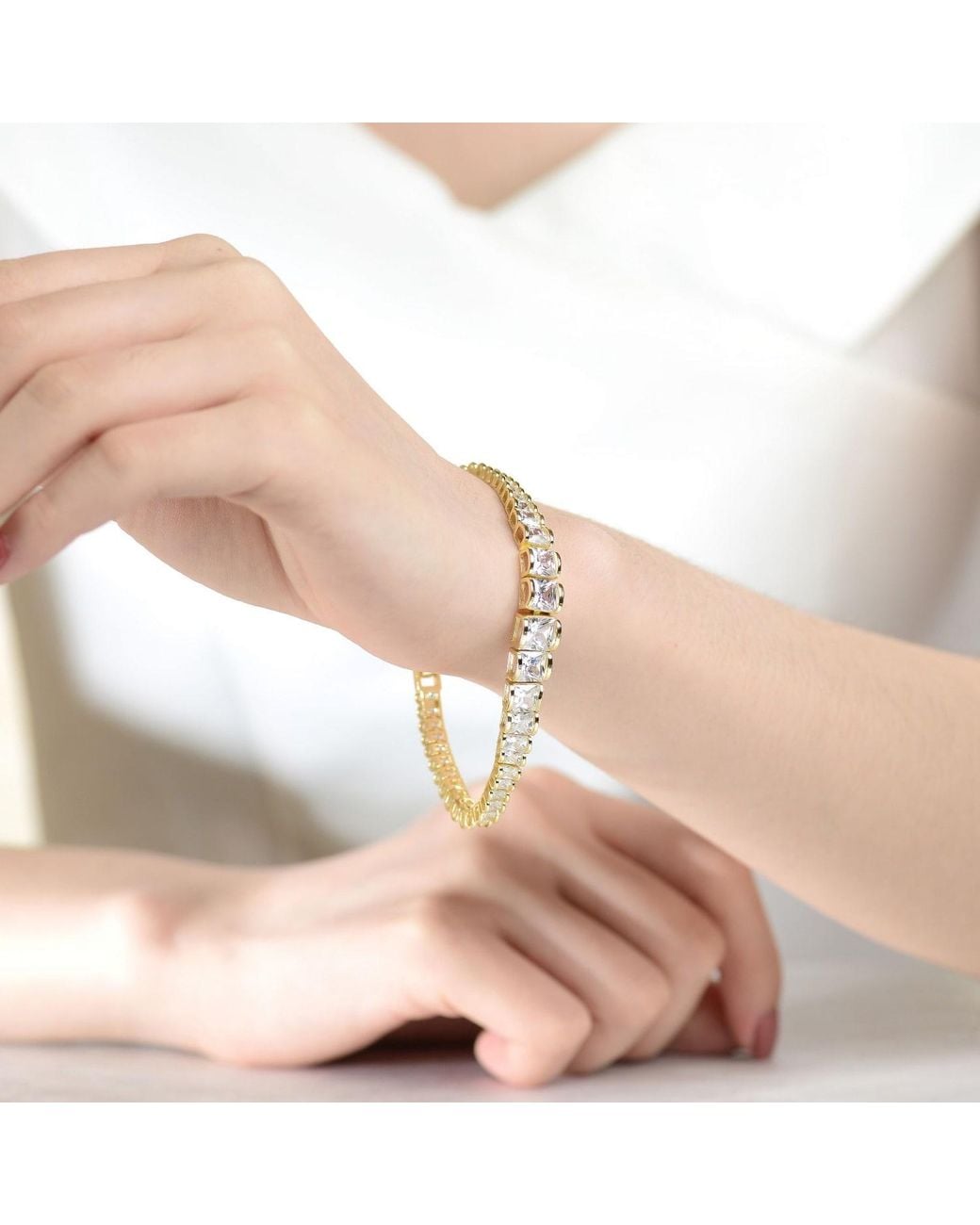 Genevive Jewelry Metallic Genevive Sterling Plated With Cubic Zirconia Graduating Tennis Bracelet