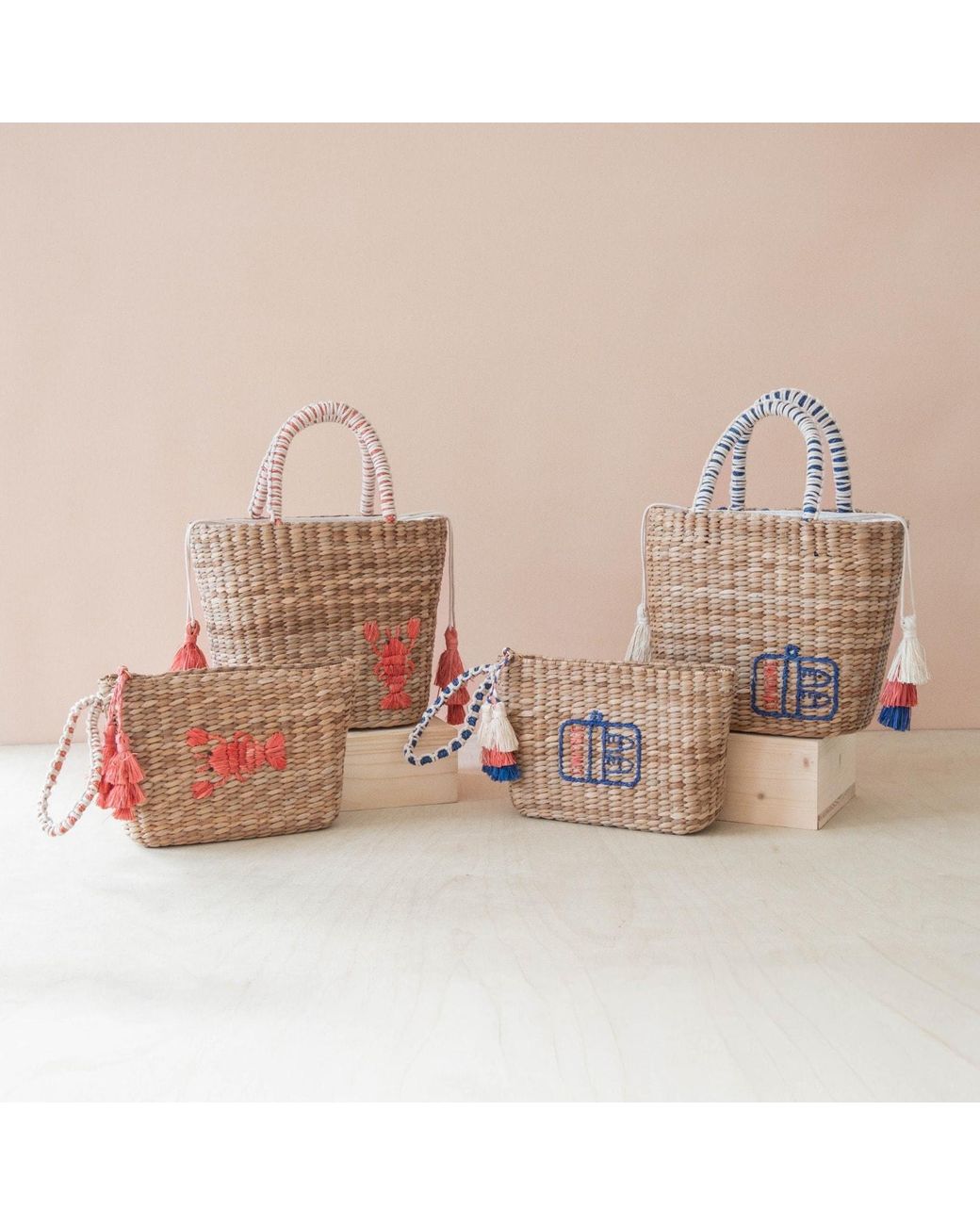 LIKHÂ Blue Neutrals Handwoven Seagrass Sardine Can Tote Bag With Tassels
