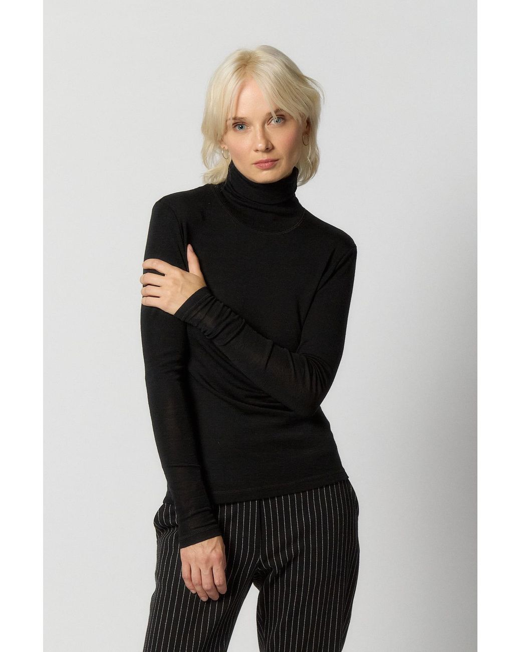Reet Aus Black Merino Wool Turtleneck Sweater For