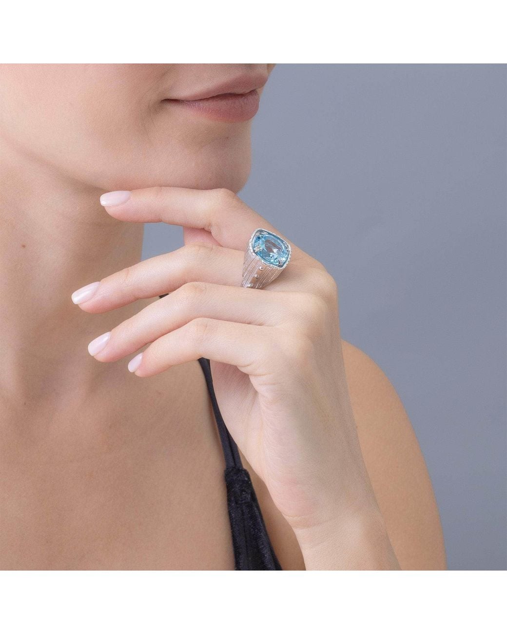 German Kabirski Blue Lyric Textured Ring With Natural Round Cut Topaz