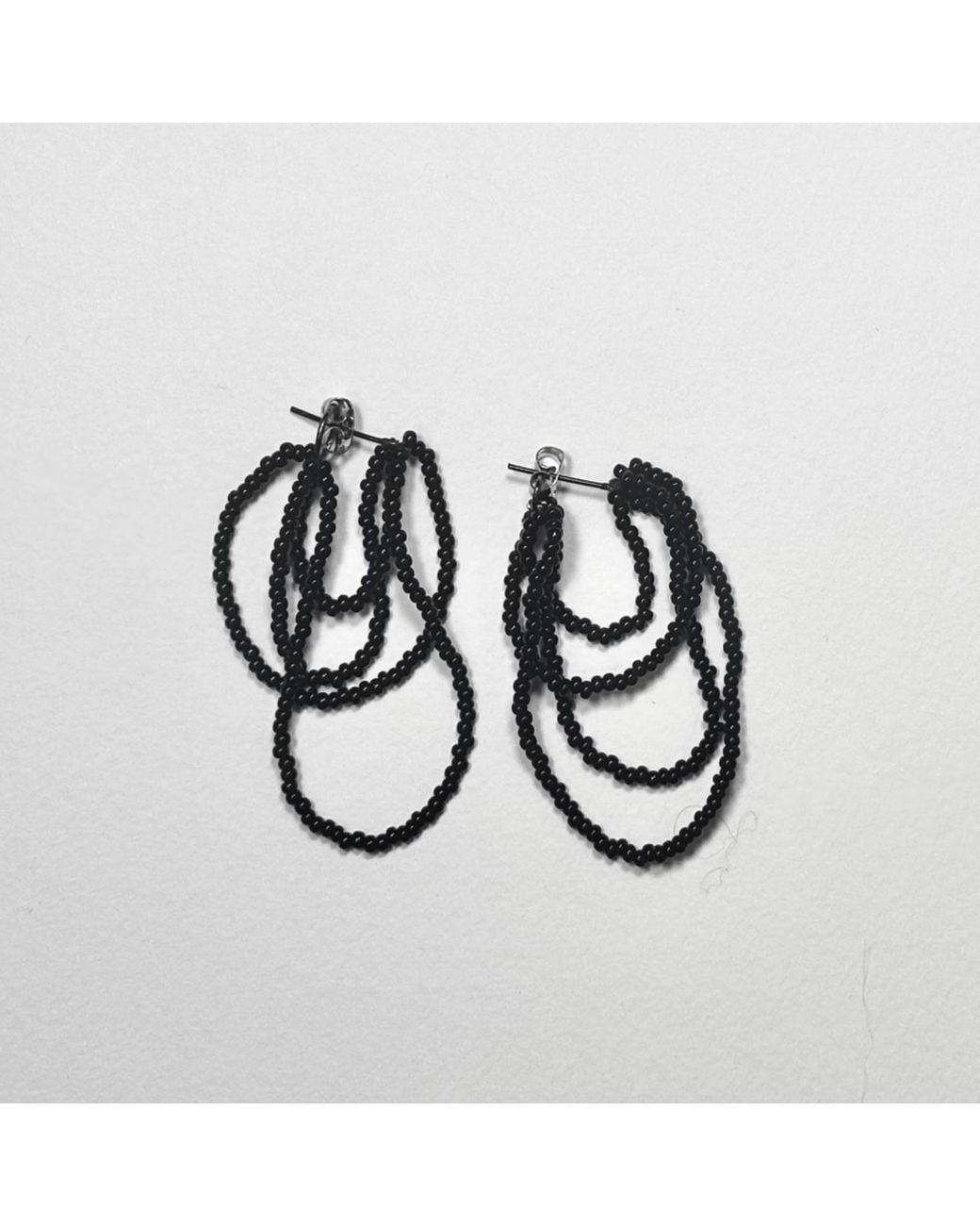 Dopamine Fix by Martina Nunez Blue Knot Now Earrings