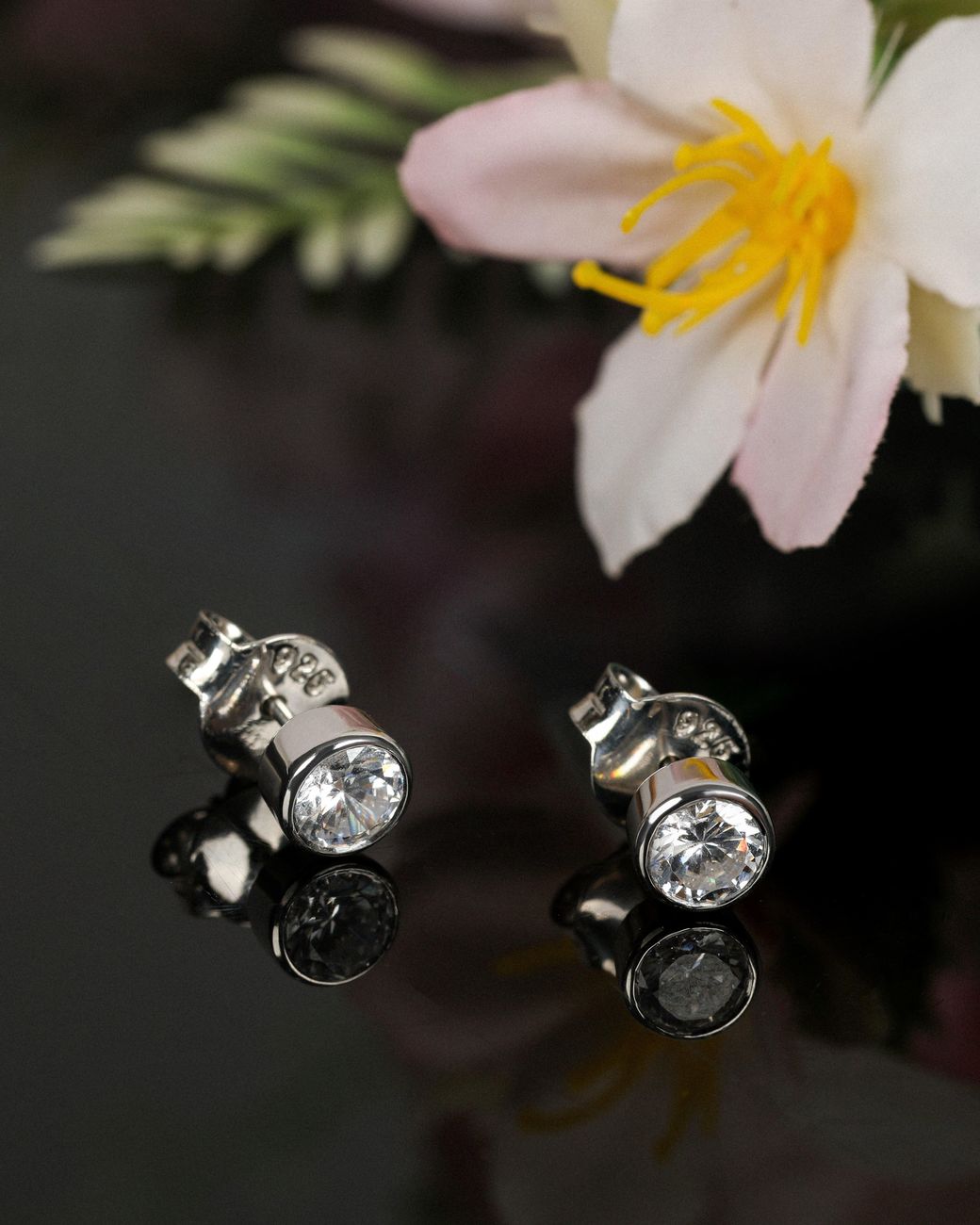 The Jewelz Metallic Round Solitaire Cz Stud Earrings for men