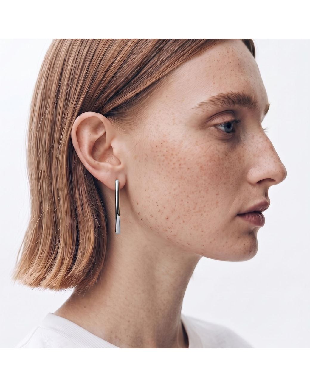 Gutta Design White Boomerang Earring Rhodium Plated