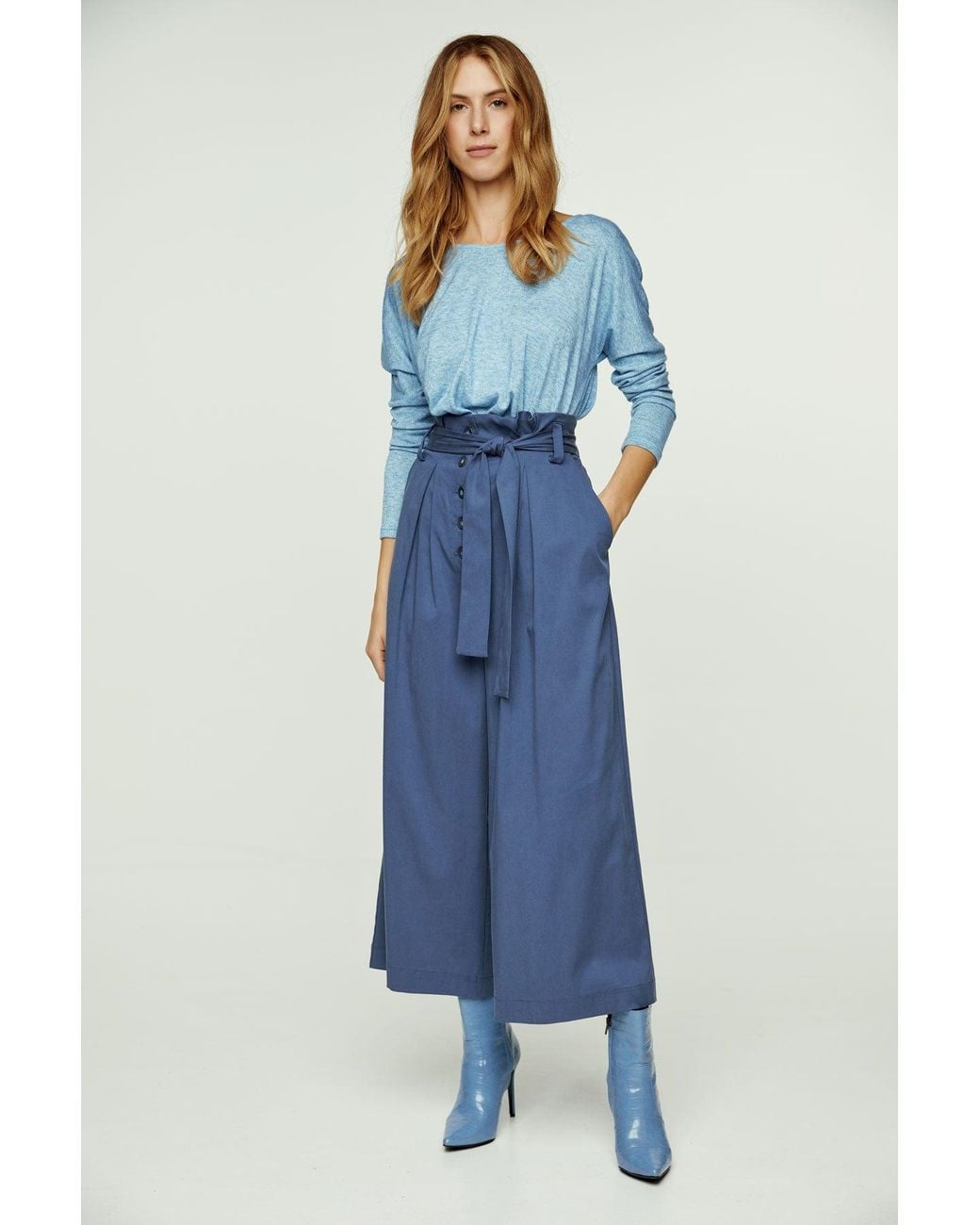 Conquista Blue Light Melange Knit Handkerchief Hem Top