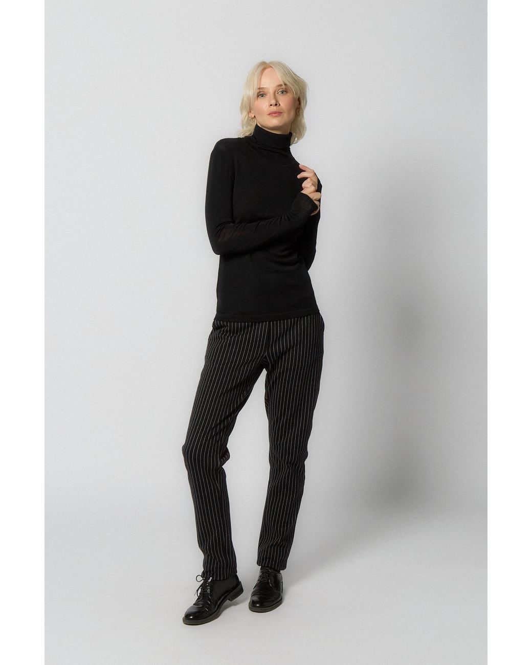 Reet Aus Black Merino Wool Turtleneck Sweater For