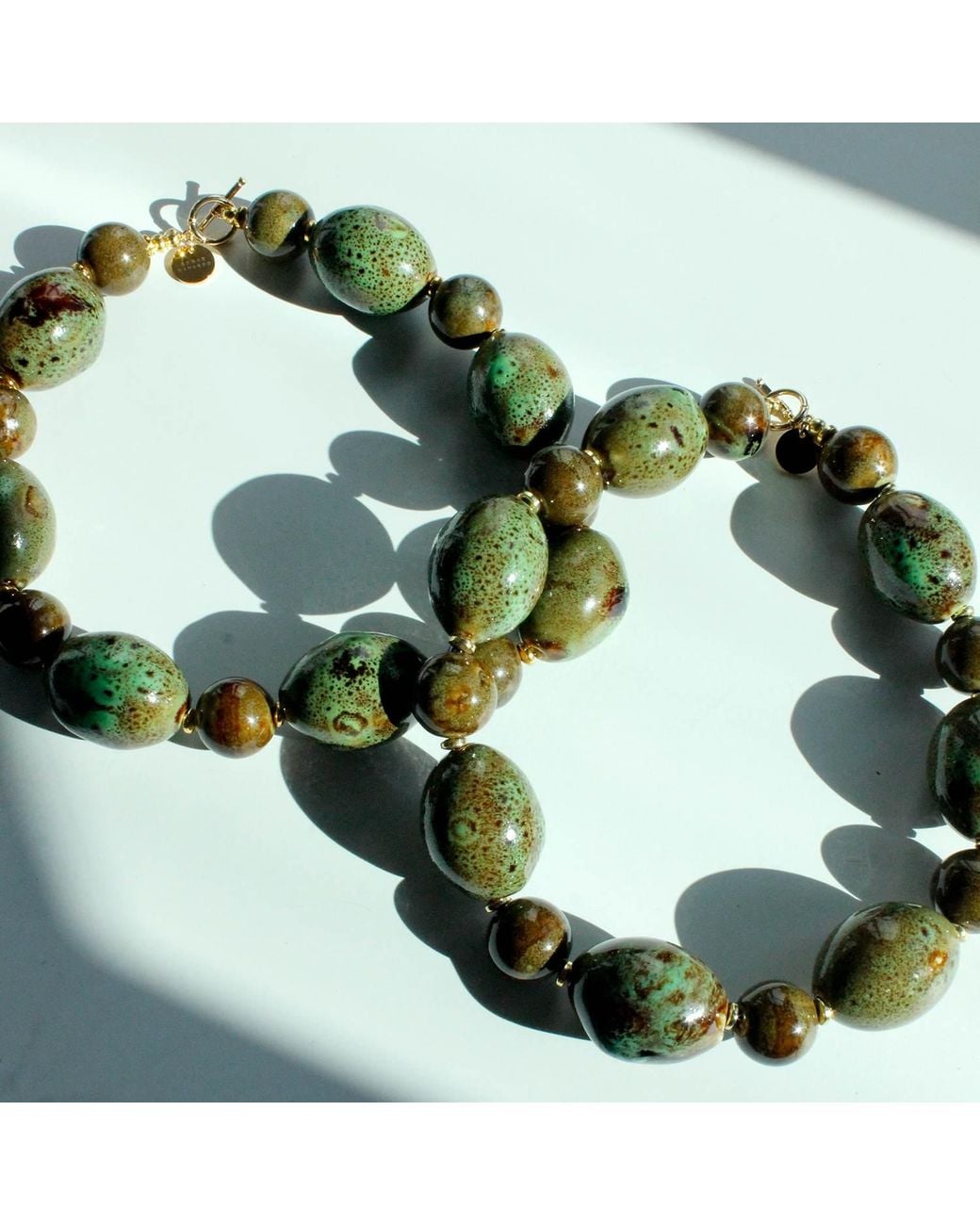 Edgar Navarro Jewelry Green Navarro Oval Ceramic Statement Necklace