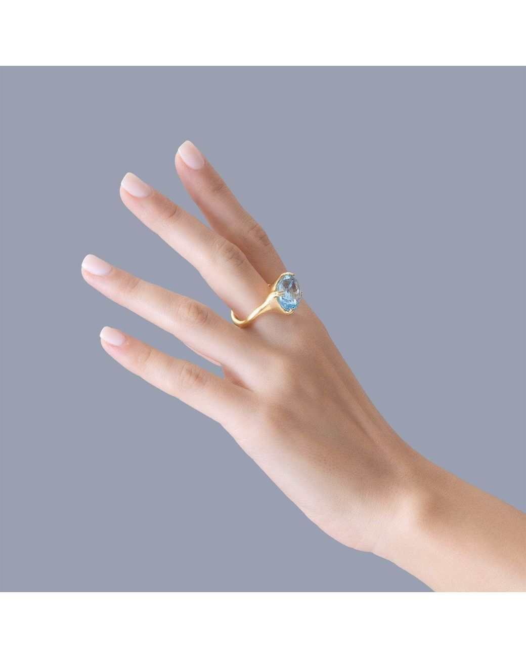 German Kabirski Blue Erya Plated Ring With Natural Oval Cut Topaz