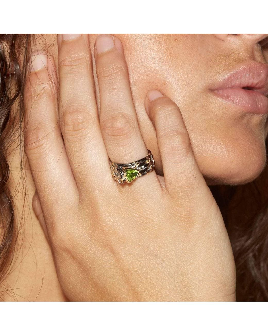 German Kabirski Metallic Nicasia Ring With Trillion Cut Peridot