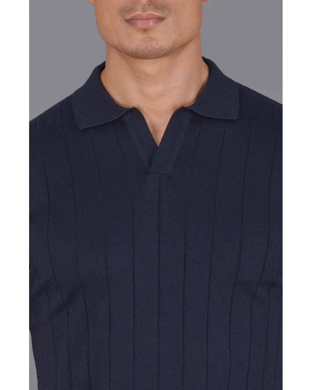 Paul James Knitwear Blue Ultra Fine Cotton Riley Selection Knit Buttonless Polo Shirt for men