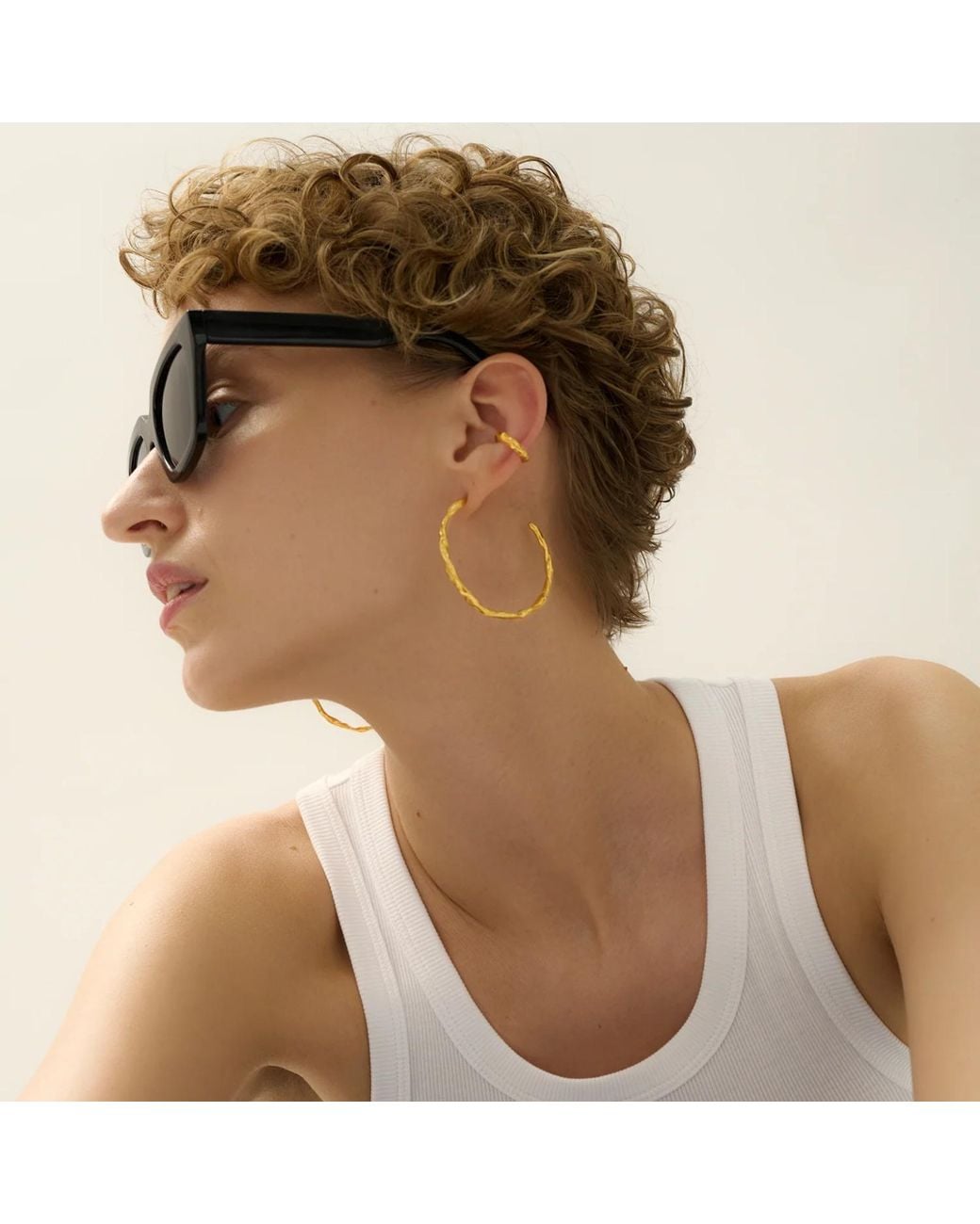 EVA REMENYI Metallic Talisman Hoop Earrings