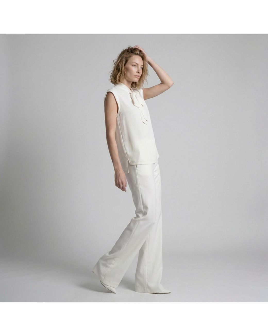 Modenaire White Sleeveless Tie Neck Blouse And Wide Leg Pant Set