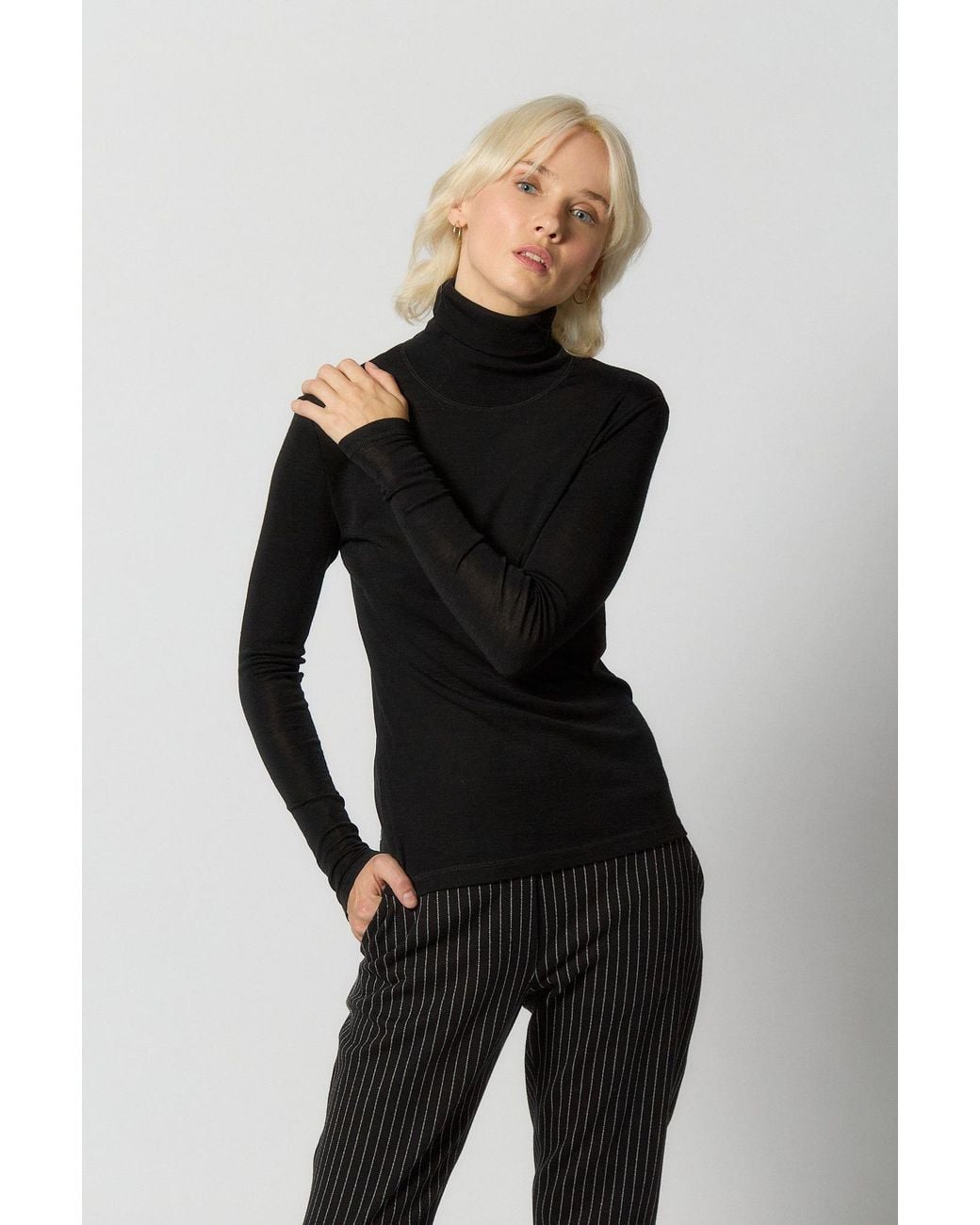 Reet Aus Black Merino Wool Turtleneck Sweater For