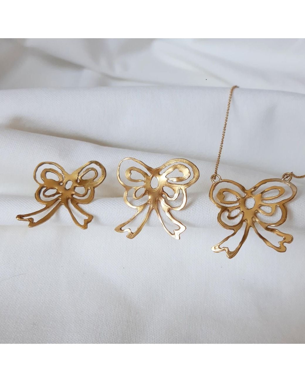 Lily Flo Jewellery Metallic Large Bow Earrings