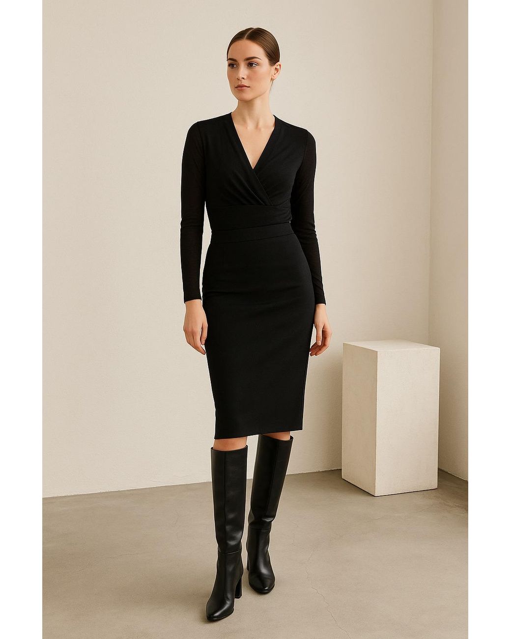 Conquista Black Long-Sleeve Top With Elegant Wrap Front