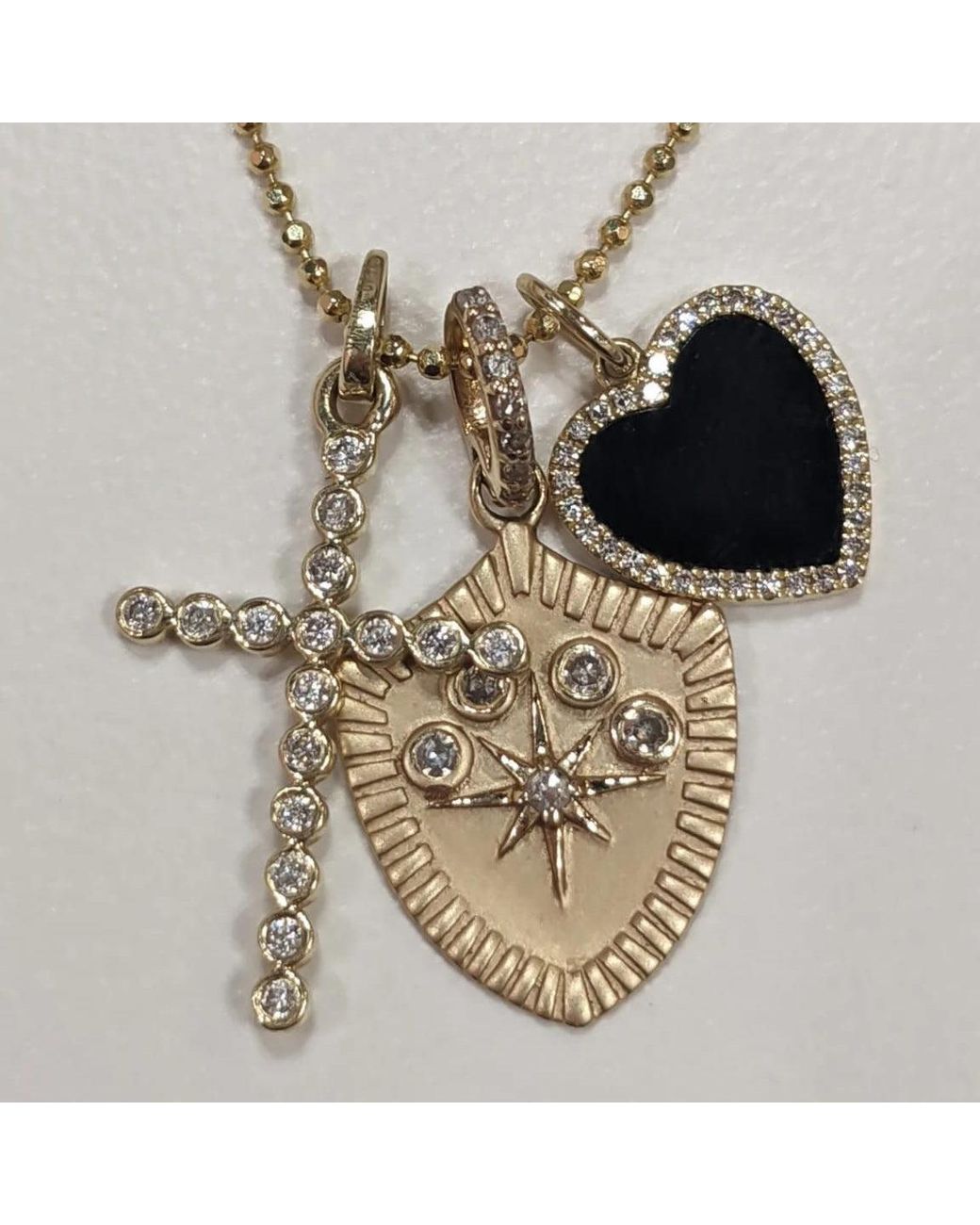 KAMARIA Metallic Diamond Cross Necklace Bezelled