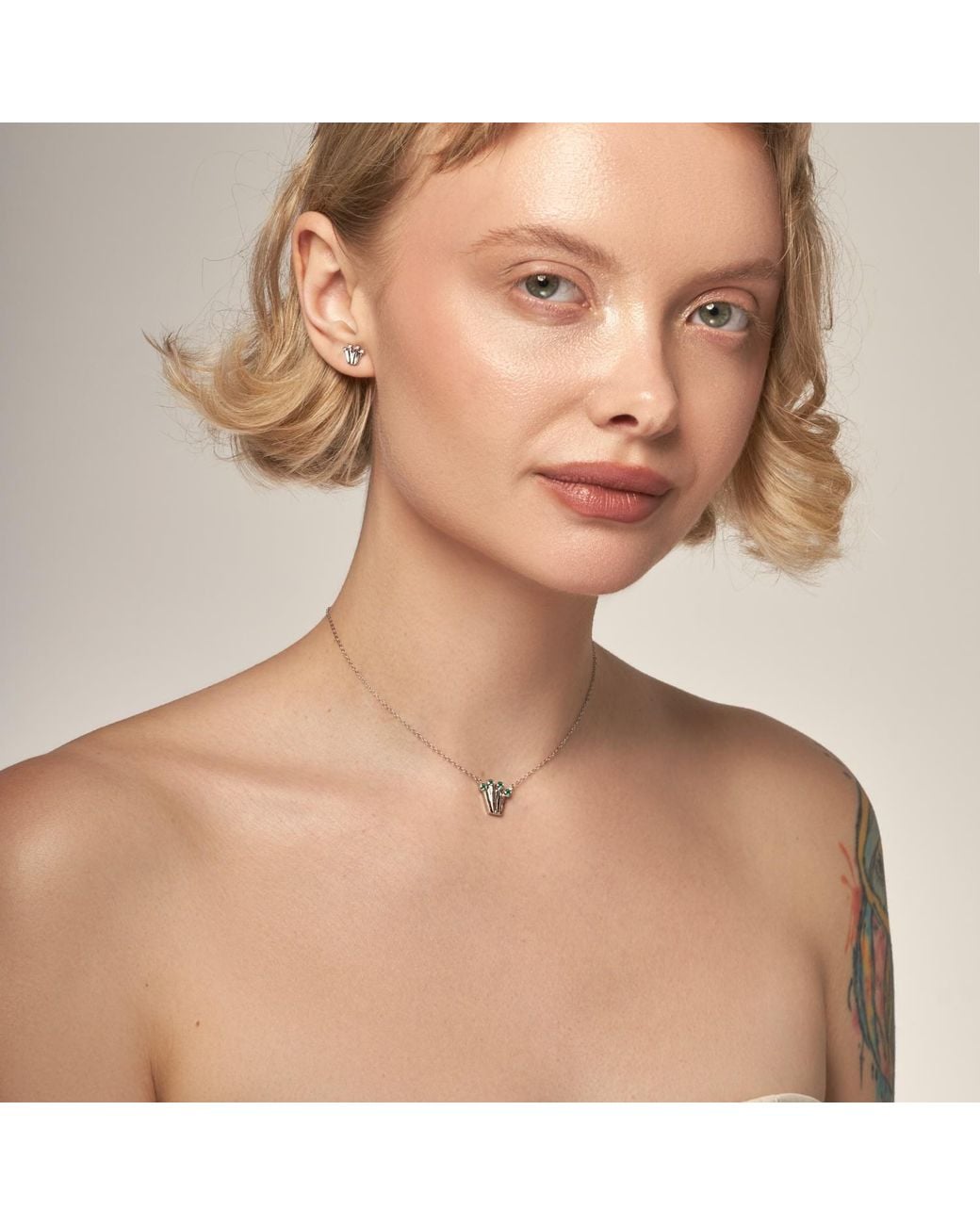 Pearl Code Metallic Crown Pendant Necklace With Diamonds