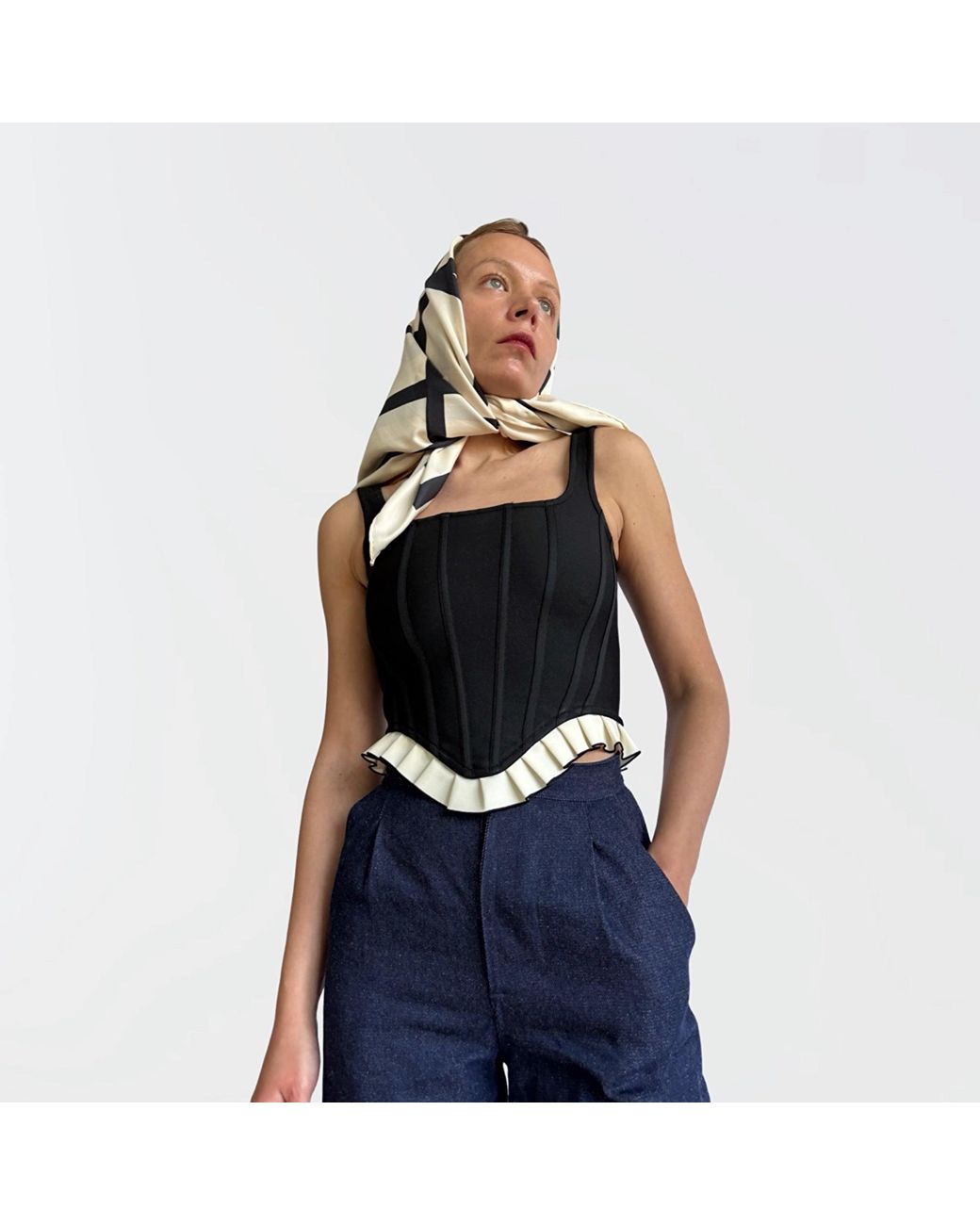 London Atelier Byproduct Black Rib Knit Corset Top With Ruffle