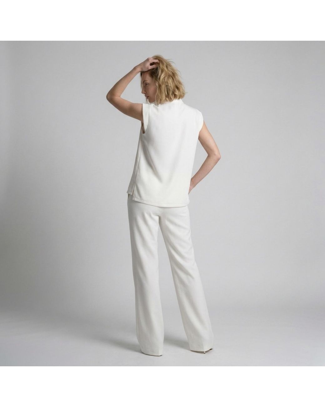 Modenaire White Sleeveless Tie Neck Blouse And Wide Leg Pant Set