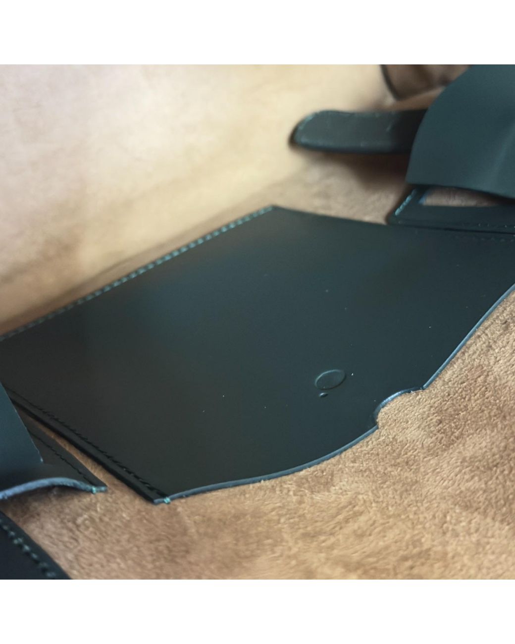 godi. Black The Roon Top Handle Leather Bag